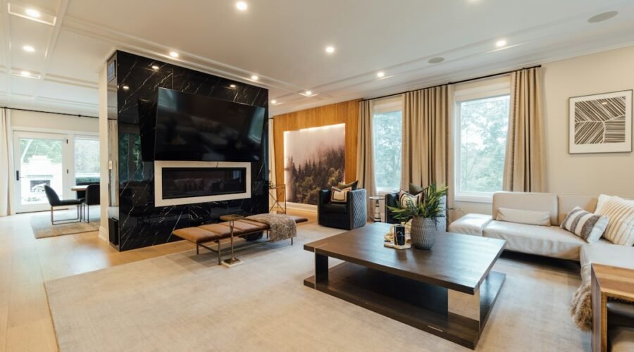 Modern living room with a connected smart home setup, illustrating the Apple HomeView smart display